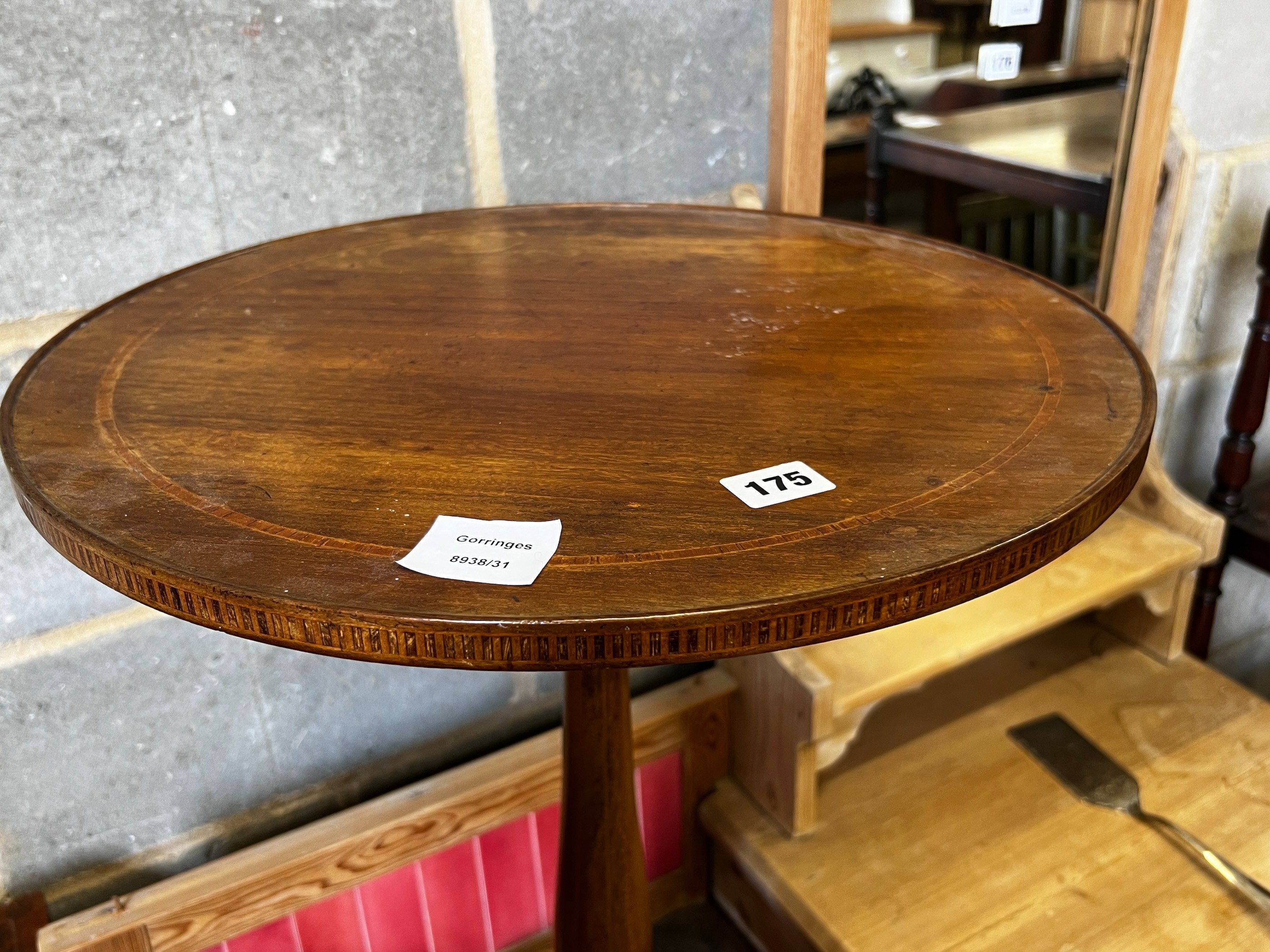 An Edwardian circular mahogany tripod wine table, diameter 44cm, height 70cm